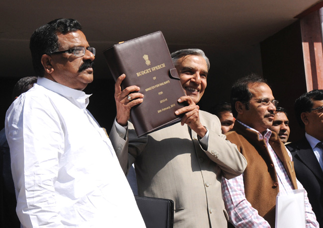 The Union Minister for Railways, Pawan Kumar Bansal departs from Rail Bhavan to Parliament House along with his deputies,  Adhir Ranjan Chowdhury and Shri K.J. Surya Prakash Reddy to present the Rail Budget 2013-14, in New Delhi on February 26, 2013.